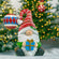 Christmas Garden Gnome Sitting with Gift and Red Striped Hat "The Goodfellows"