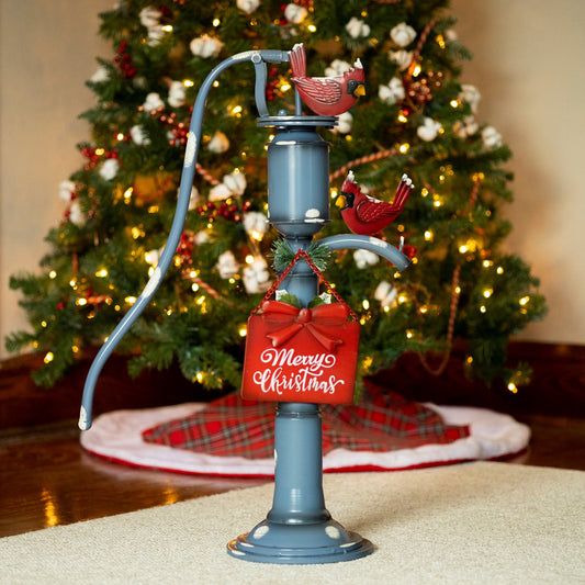 Old Style Blue Iron Water Pump with Merry Christmas Sign